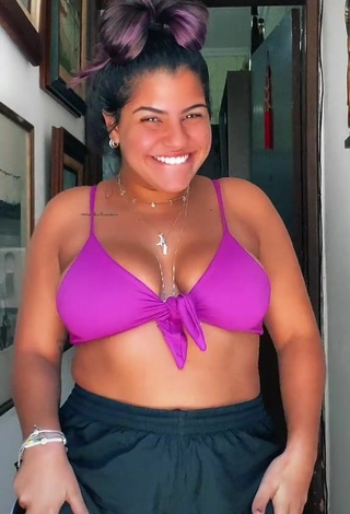 Alluring Julia Antunes Shows Cleavage and Bouncing Boobs in Erotic Violet Bikini Top
