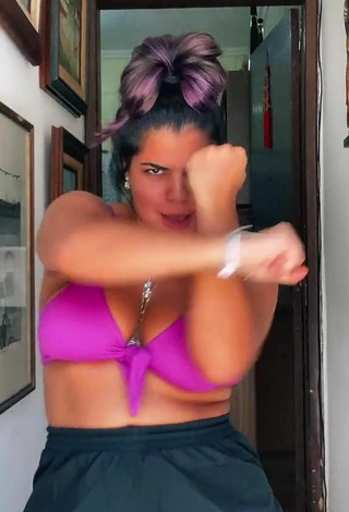 2. Alluring Julia Antunes Shows Cleavage and Bouncing Boobs in Erotic Violet Bikini Top