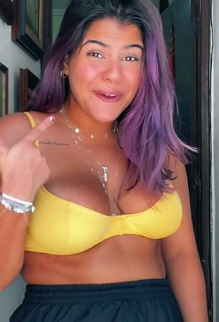 Hottest Julia Antunes Shows Cleavage in Yellow Bikini Top