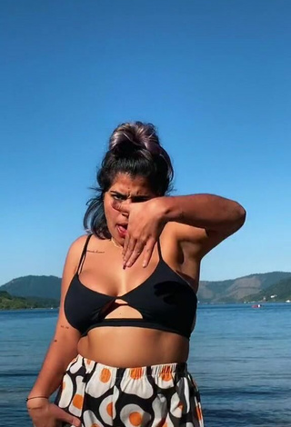 Hot Julia Antunes Shows Cleavage in Black Bikini Top