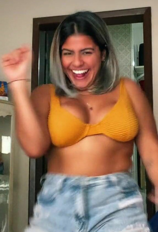 4. Sexy Julia Antunes Shows Cleavage and Bouncing Boobs in Yellow Bikini Top
