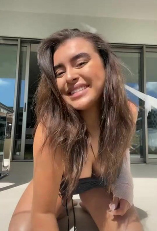 Sexy Kalani Hilliker Shows Cleavage in Black Swimsuit