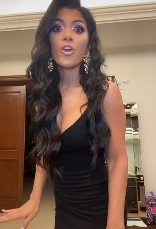 Sweetie Kimberly Flores Shows Cleavage in Black Dress