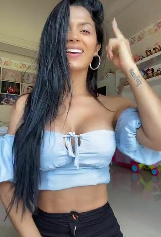 5. Seductive Kimberly Flores Shows Cleavage in Blue Crop Top