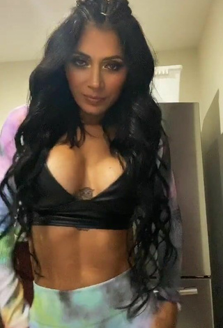 2. Sweet Kimberly Flores Shows Cleavage in Cute Black Crop Top