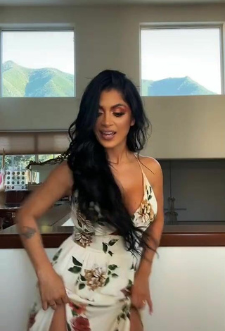 2. Cute Kimberly Flores Shows Cleavage in Floral Dress