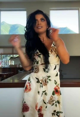 3. Cute Kimberly Flores Shows Cleavage in Floral Dress