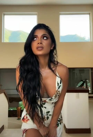Hot Kimberly Flores Shows Cleavage in Floral Dress
