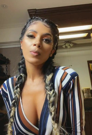 Sexy Kimberly Flores Shows Cleavage in Striped Overall