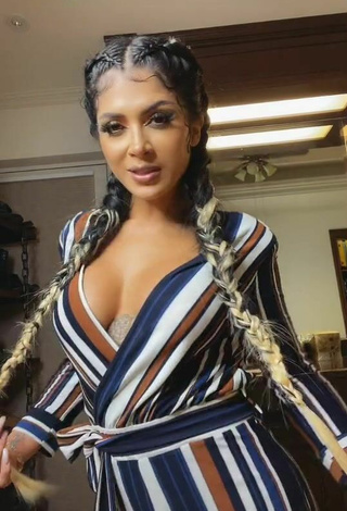 2. Sexy Kimberly Flores Shows Cleavage in Striped Overall