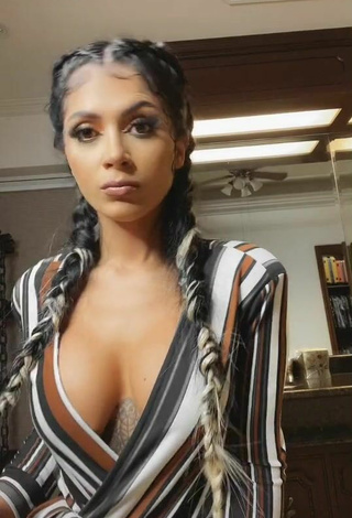 Sexy Kimberly Flores Shows Cleavage