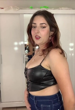2. Sexy Laura Seraphim Shows Cleavage in Black Crop Top