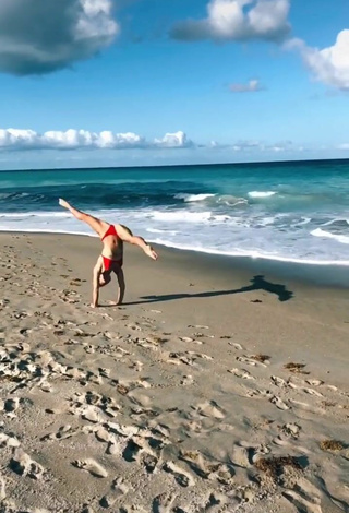 2. Dazzling Olivia Dunne in Inviting Red Bikini at the Beach