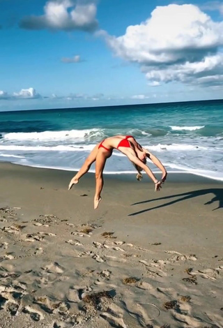 3. Dazzling Olivia Dunne in Inviting Red Bikini at the Beach