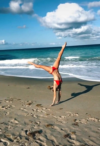 Dazzling Olivia Dunne in Inviting Red Bikini at the Beach