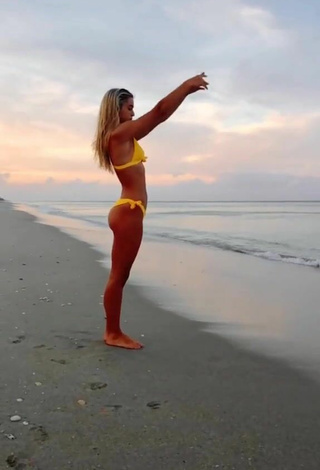 Really Cute Olivia Dunne in Yellow Bikini at the Beach while doing Fitness Exercises