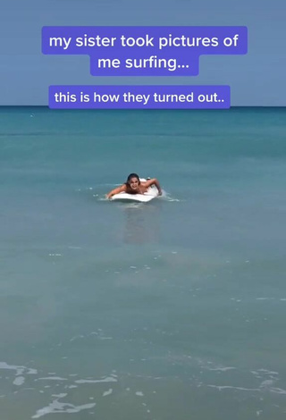 1. Breathtaking Olivia Dunne in White Bikini in the Sea at the Beach