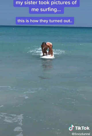 3. Breathtaking Olivia Dunne in White Bikini in the Sea at the Beach