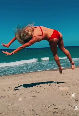3. Sweetie Olivia Dunne in Red Bikini at the Beach while doing Fitness Exercises