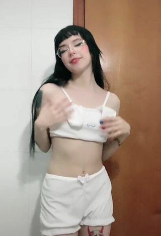 3. Sexy Luh Setra in White Crop Top