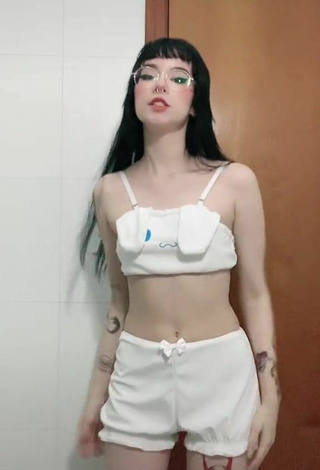 4. Sexy Luh Setra in White Crop Top