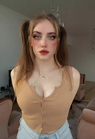 1. Beautiful Magui Ansuz Shows Cleavage in Sexy Beige Crop Top