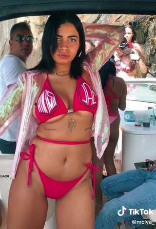 Beautiful MC Lya Shows Cleavage in Sexy Red Bikini