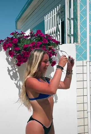 4. Sexy Melissa Gilardii in Blue Bikini Top