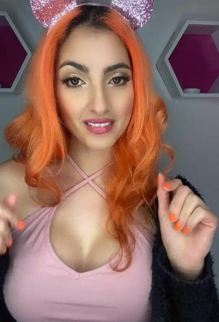 Sexy Mia Coloridas Shows Cleavage in Pink Top