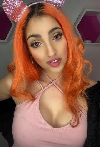 4. Sexy Mia Coloridas Shows Cleavage in Pink Top