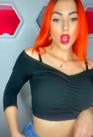 4. Sexy Mia Coloridas Shows Cleavage in Black Crop Top