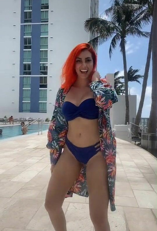 Cute Mia Coloridas Shows Cleavage in Blue Bikini at the Swimming Pool