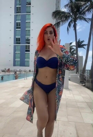 4. Cute Mia Coloridas Shows Cleavage in Blue Bikini at the Swimming Pool