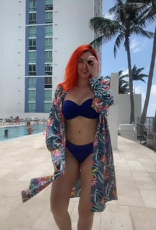 5. Cute Mia Coloridas Shows Cleavage in Blue Bikini at the Swimming Pool