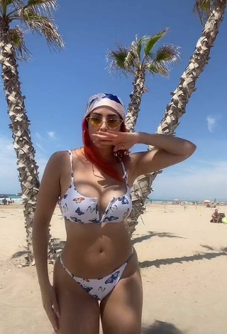 5. Hot Mia Coloridas Shows Cleavage in Bikini at the Beach