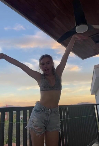 Sweetie Alex French in Leopard Bikini Top on the Balcony