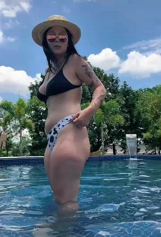 4. Sweetie Nina Castanheira Shows Cleavage in Black Bikini Top at the Pool
