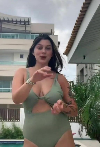 3. Sexy Nina Castanheira Shows Cleavage in Olive Swimsuit and Bouncing Breasts