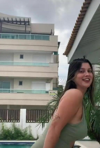 5. Sexy Nina Castanheira Shows Cleavage in Olive Swimsuit and Bouncing Breasts