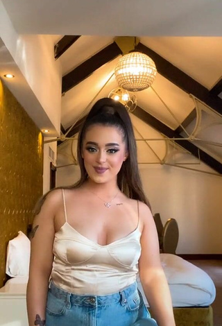 Sexy Olivia Duffin Shows Cleavage in Top and Bouncing Boobs