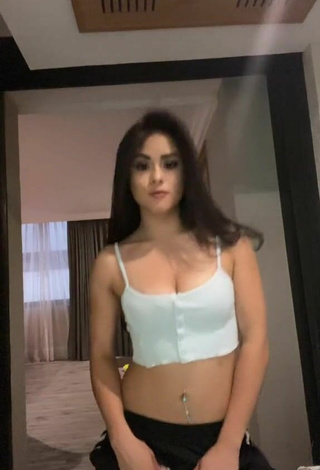 Beautiful Ónice Flores Shows Cleavage in Sexy Blue Crop Top
