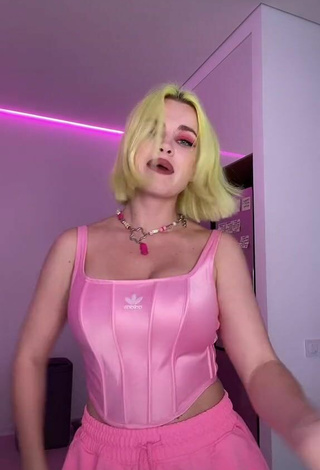 5. Hot Rasa Shows Cleavage in Pink Corset