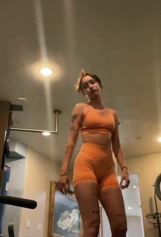 4. Sexy Rhegan Coursey in Orange Sport Bra