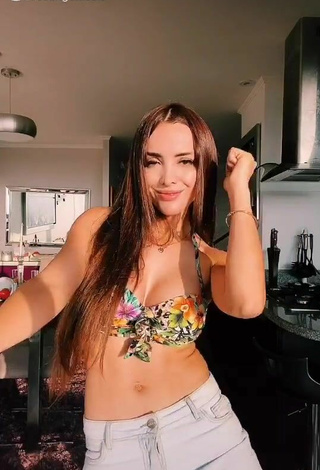 2. Seductive Rosángela Espinoza Shows Cleavage in Floral Bikini Top