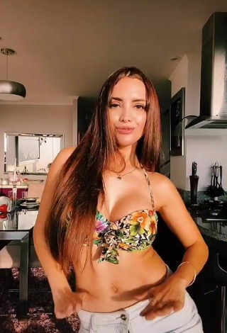 4. Seductive Rosángela Espinoza Shows Cleavage in Floral Bikini Top