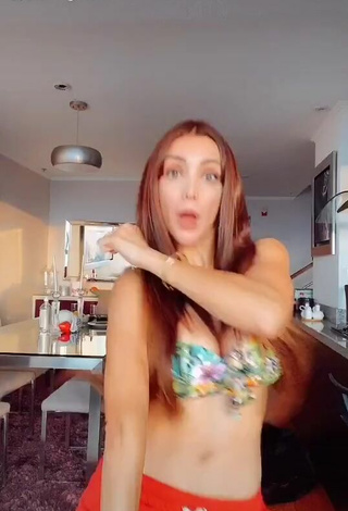 Erotic Rosángela Espinoza Shows Cleavage in Floral Bikini Top