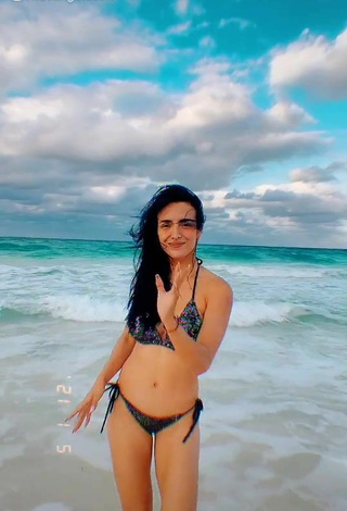 Magnificent Rosángela Espinoza Shows Cleavage in Black Bikini at the Beach