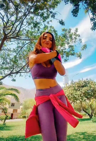 2. Sexy Rosángela Espinoza Shows Cleavage in Purple Sport Bra