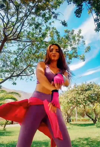 3. Sexy Rosángela Espinoza Shows Cleavage in Purple Sport Bra