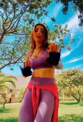 4. Sexy Rosángela Espinoza Shows Cleavage in Purple Sport Bra